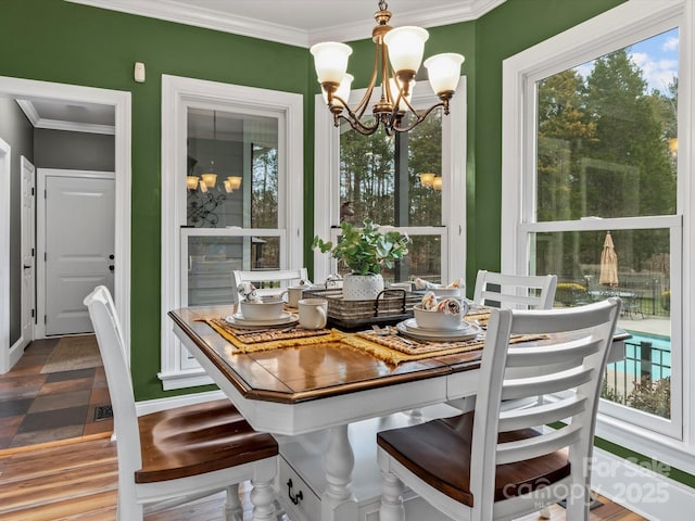 sunroom / solarium with an inviting chandelier