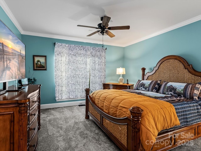 carpeted bedroom featuring ceiling fan, ornamental molding, and baseboards