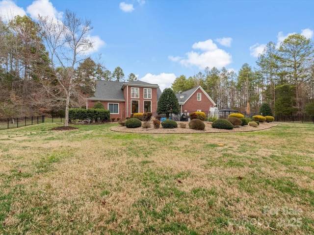 view of yard with fence