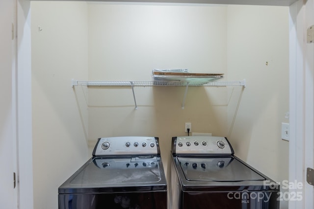 laundry area with washer and clothes dryer