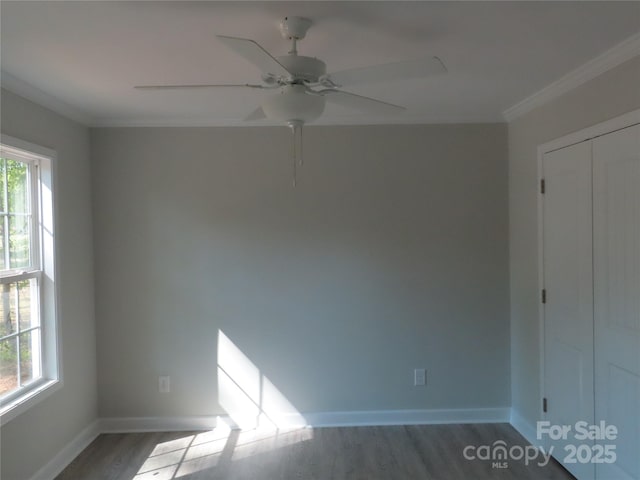 635 Acre Ct, York, SC 29745 - empty room with baseboards, ornamental molding, wood finished floors, and a wealth of natural light