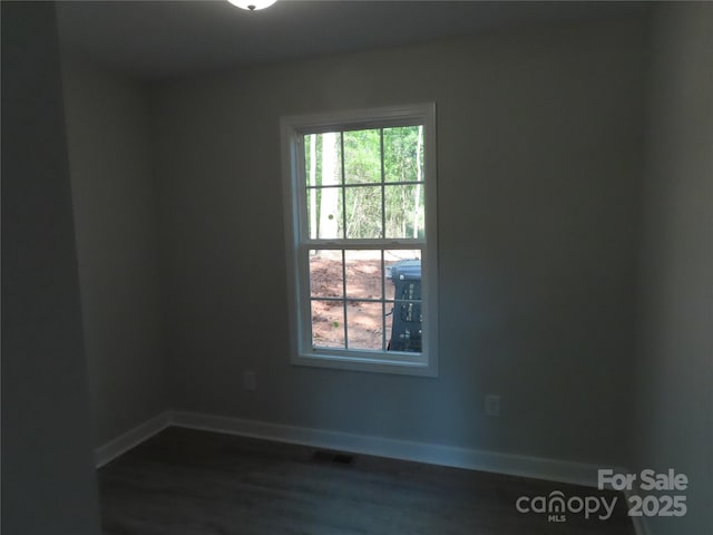 635 Acre Ct, York, SC 29745 - spare room featuring baseboards, dark wood-style flooring, and visible vents