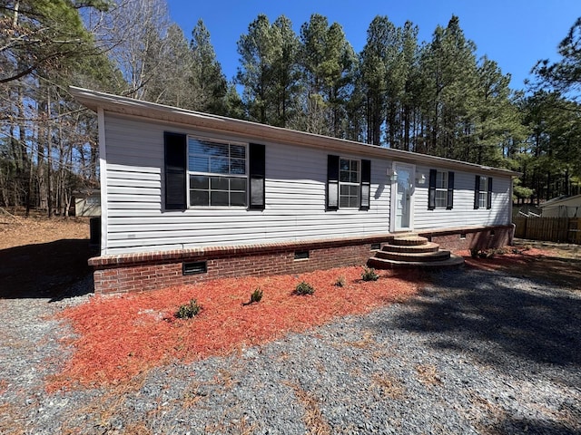 manufactured / mobile home featuring crawl space and entry steps