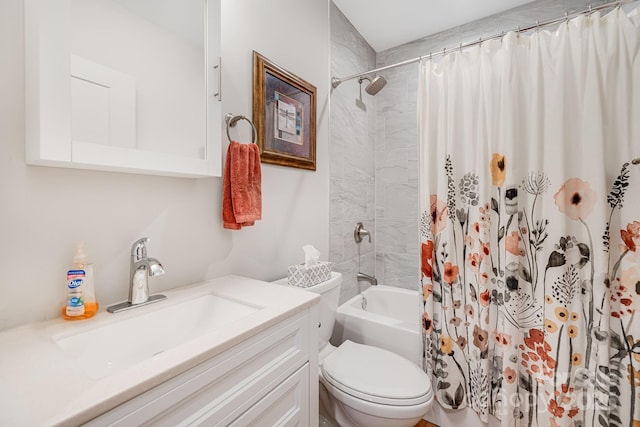 full bathroom featuring vanity, shower / bath combination with curtain, and toilet