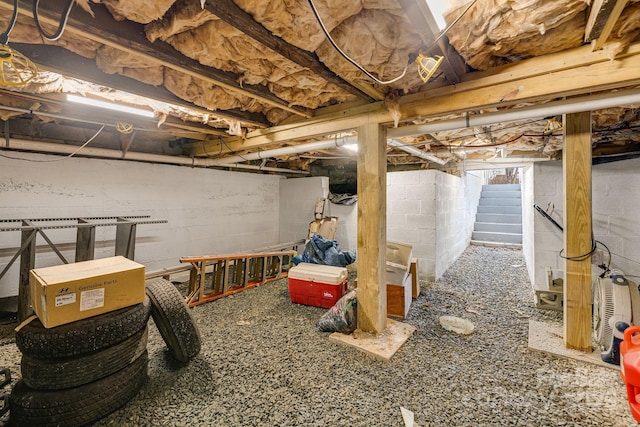 unfinished basement with stairs