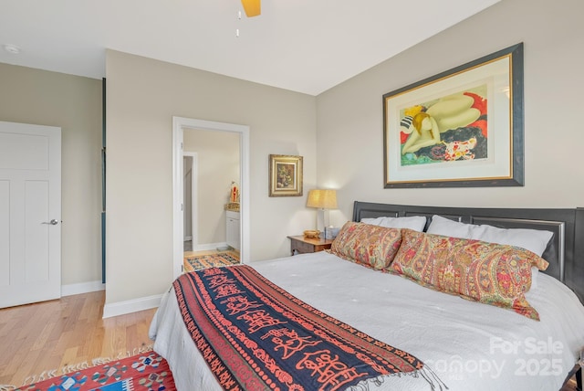 50 Rose Creek Rd, Leicester, NC 28748 - bedroom with baseboards, light wood finished floors, ceiling fan, and ensuite bath
