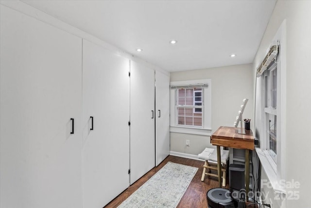 office space with baseboards, dark wood-type flooring, and recessed lighting