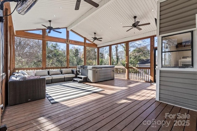 unfurnished sunroom with vaulted ceiling with beams