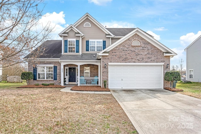 traditional-style house featuring a porch, a garage, brick siding, driveway, and a front lawn