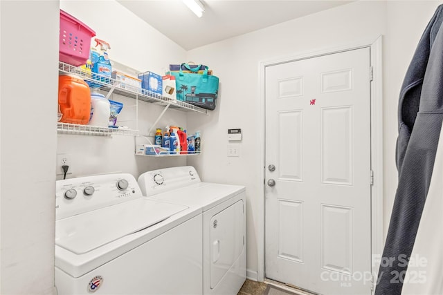 washroom with laundry area and washing machine and clothes dryer