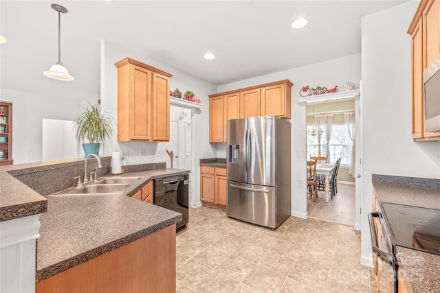 kitchen featuring dark countertops, a sink, black appliances, and recessed lighting