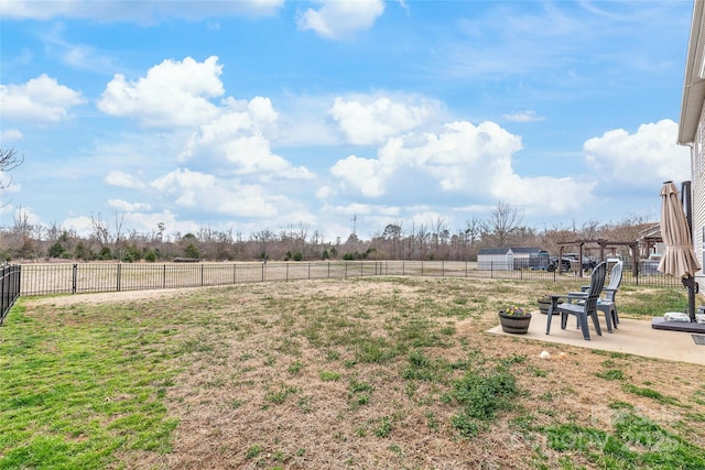 view of yard featuring a patio area and fence