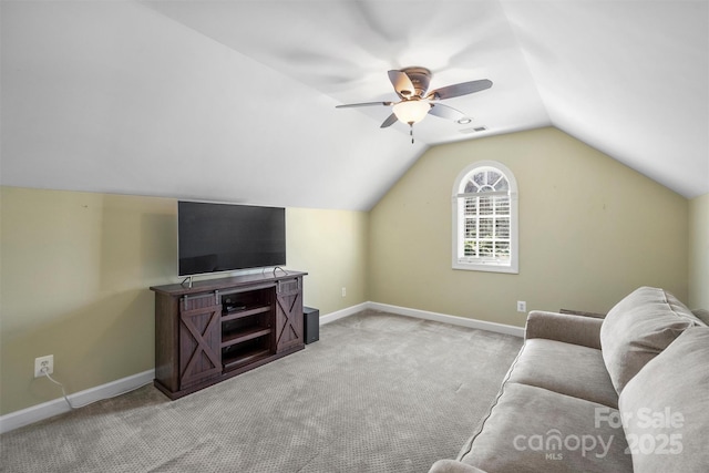 living area with visible vents, vaulted ceiling, light carpet, and baseboards