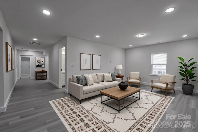 116 11th St, Spencer, NC 28159 - living area featuring wood finished floors and recessed lighting
