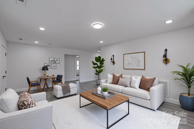 116 11th St, Spencer, NC 28159 - living room featuring wood finished floors and recessed lighting