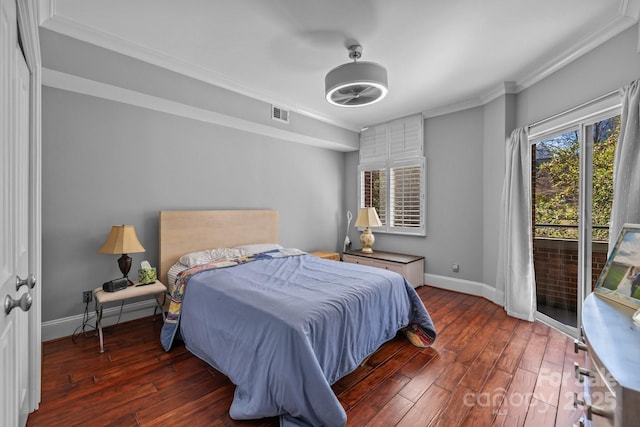 bedroom featuring visible vents, baseboards, wood-type flooring, ornamental molding, and access to exterior