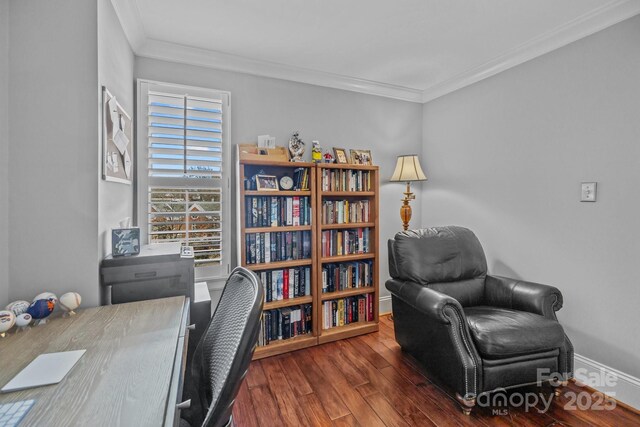 office featuring crown molding, baseboards, and wood finished floors