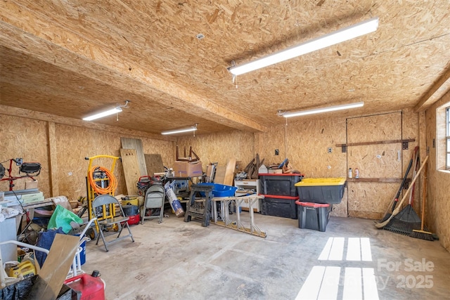 garage with a workshop area