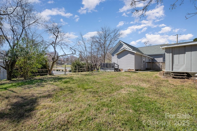 view of yard featuring a deck