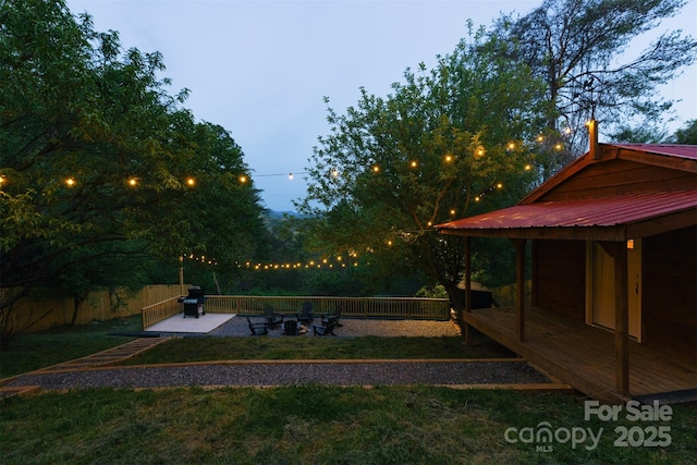 view of yard with a fenced backyard and a patio