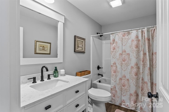 bathroom with wood finished floors, vanity, toilet, and shower / bath combo with shower curtain