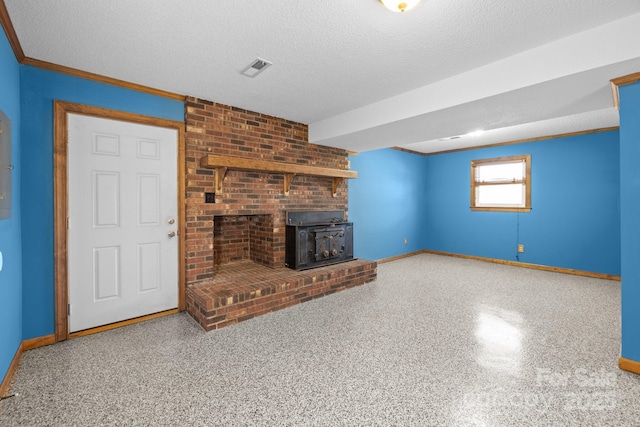 unfurnished living room with visible vents, a textured ceiling, baseboards, and speckled floor