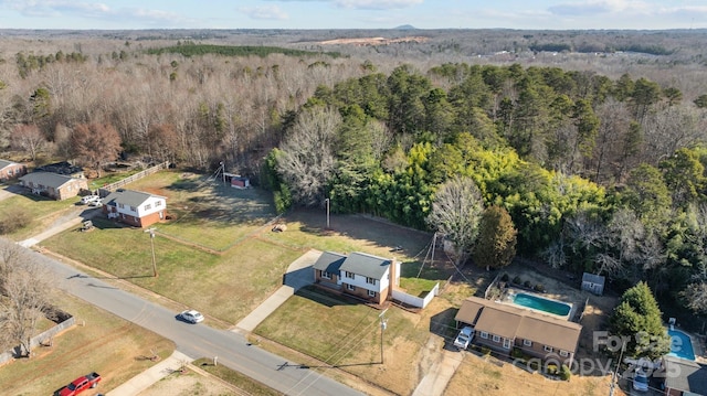 bird's eye view featuring a view of trees