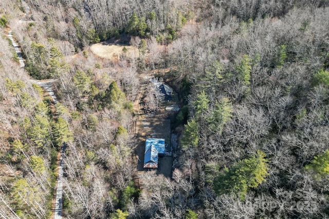 aerial view featuring a forest view