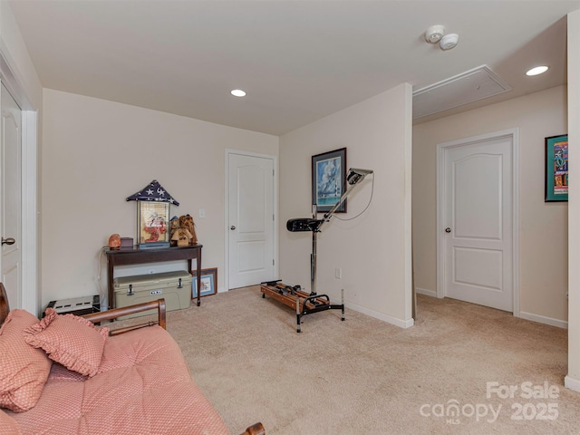 workout area featuring baseboards, carpet flooring, attic access, and recessed lighting