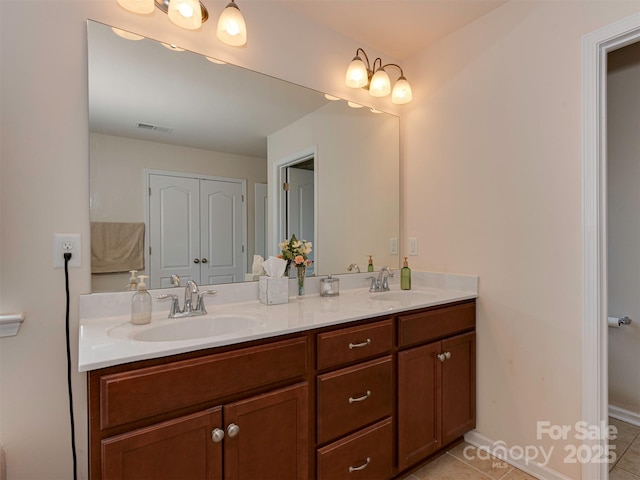 full bathroom with tile patterned flooring, visible vents, a sink, and double vanity