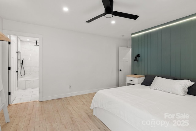 bedroom with recessed lighting, light wood-style flooring, ensuite bathroom, ceiling fan, and baseboards