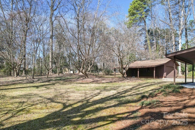 view of yard with an attached garage