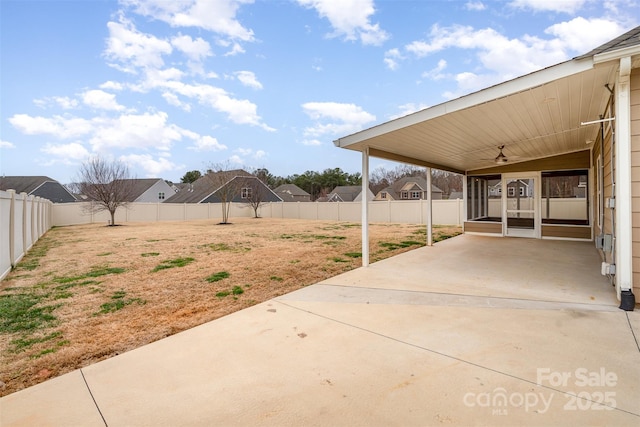 view of yard featuring a patio area and a fenced backyard