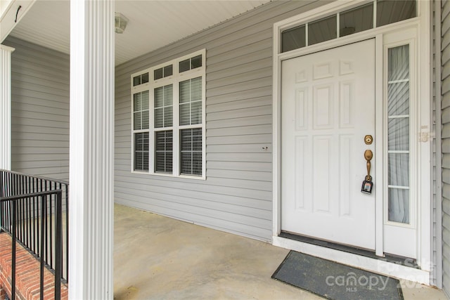 entrance to property with a porch