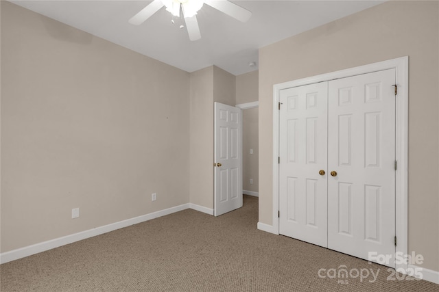 unfurnished bedroom featuring a closet, ceiling fan, baseboards, and carpet floors