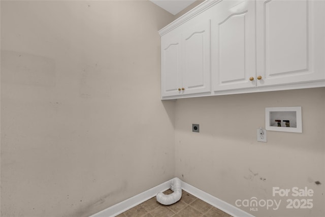 clothes washing area with cabinet space, baseboards, electric dryer hookup, and hookup for a washing machine