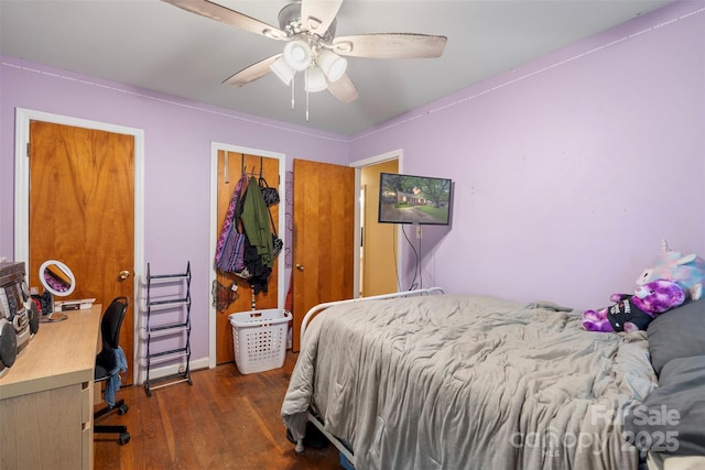 bedroom with ceiling fan and wood finished floors