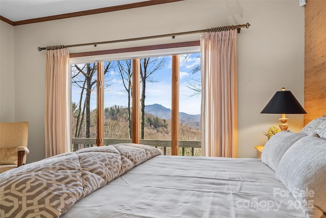 243 Red Oak Trl, Boone, NC 28607 - bedroom featuring access to exterior, ornamental molding, and a mountain view