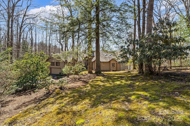 243 Red Oak Trl, Boone, NC 28607 - view of yard with a garage