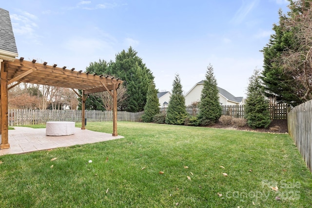 view of yard with a fenced backyard, a patio, and a pergola