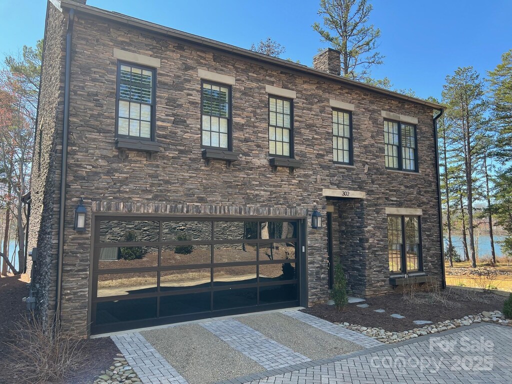 view of front of house with a chimney