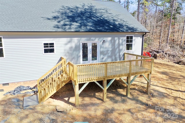 back of house with a shingled roof, crawl space, and a wooden deck