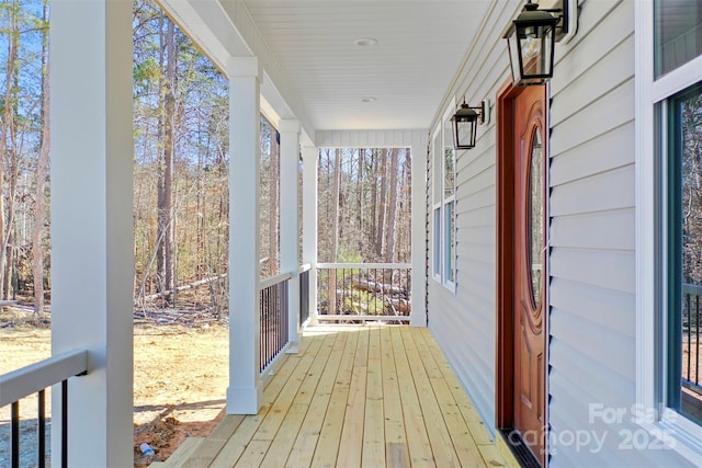 wooden deck featuring a porch