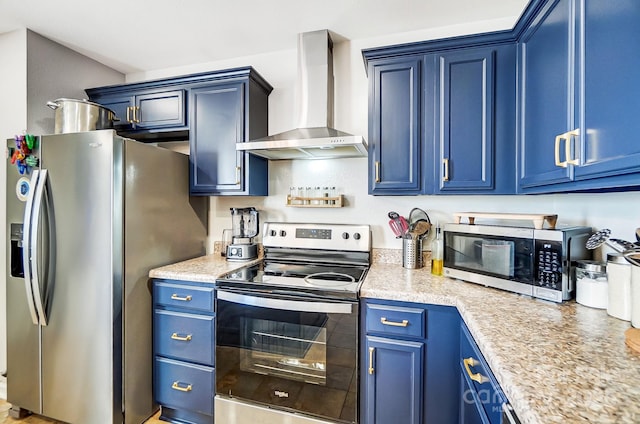 kitchen featuring wall chimney exhaust hood, appliances with stainless steel finishes, light countertops, and blue cabinets