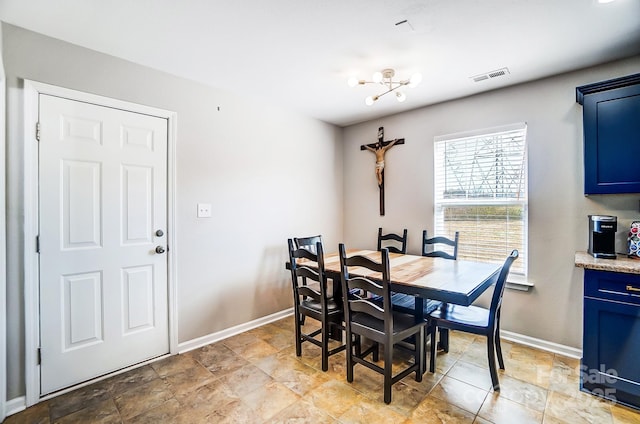 dining area with visible vents and baseboards