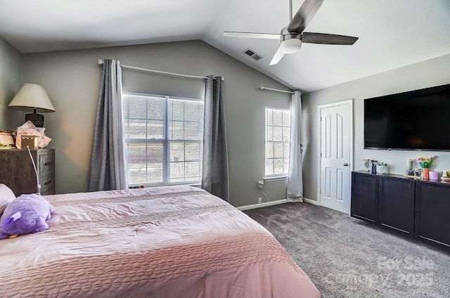 bedroom with lofted ceiling, ceiling fan, visible vents, baseboards, and dark colored carpet