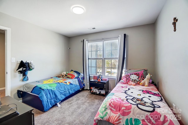 carpeted bedroom with visible vents