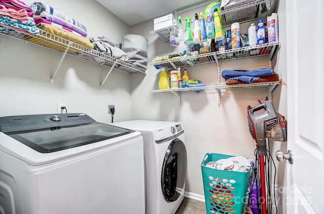 washroom featuring washer and dryer and laundry area