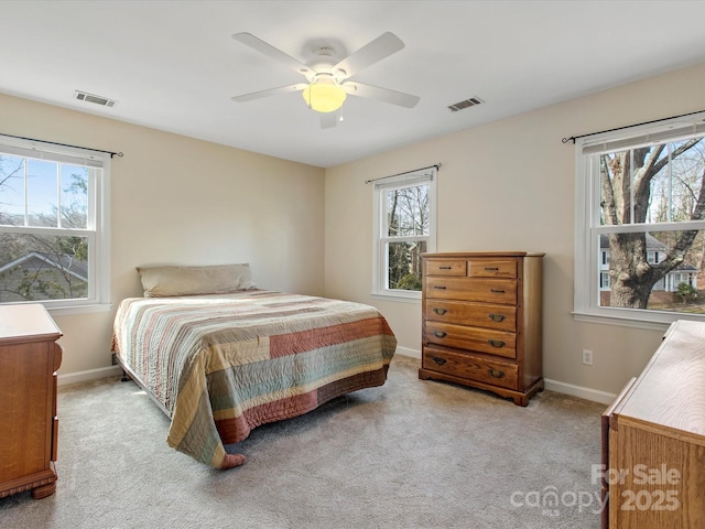 bedroom featuring carpet, baseboards, and visible vents