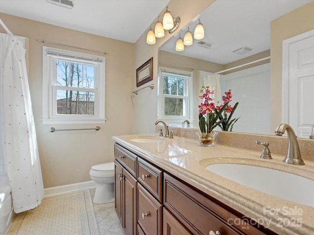 full bathroom with visible vents, toilet, baseboards, and a sink